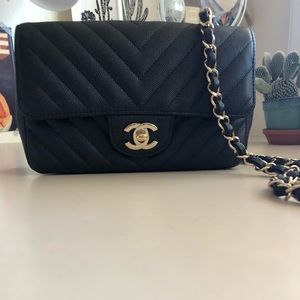 Practically New CHANEL mini bag in black
